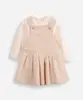 salopete de tweed infantil com body texturizada bege 18-24