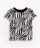 blusa infantil de malha canelada animal print manga curta multicor 8
