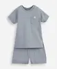 conjunto baby camiseta e bermuda texturizado azul 3-6