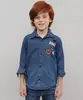Camisa Jeans Infantil com Patch Os Vingadores Manga Longa Azul Médio 10