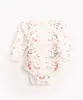 body texturizado infantil floral manga longa off white 0-3