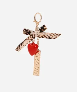 chaveiro bag charm com laço e amour colorido UNICO