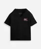 polo oversized infantil manga curta texturizada preta 12