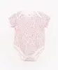 body infantil de algodão manga curta floral rosa claro 6-9