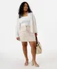 saia curta feminina de sarja floral plus size rosa 48