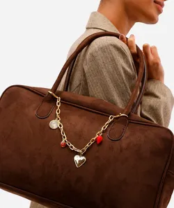 chaveiro bag charm mix de pingentes dourado UNICO