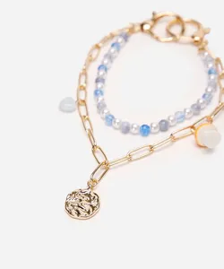 chaveiro bag charm com pérolas e cogumelo dourado UNICO