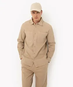 camisa oversized texturizada com bolsos manga longa bege claro PP