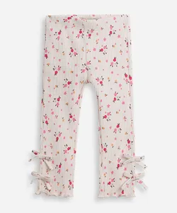 calça infantil flare estampada com laços colorido 4